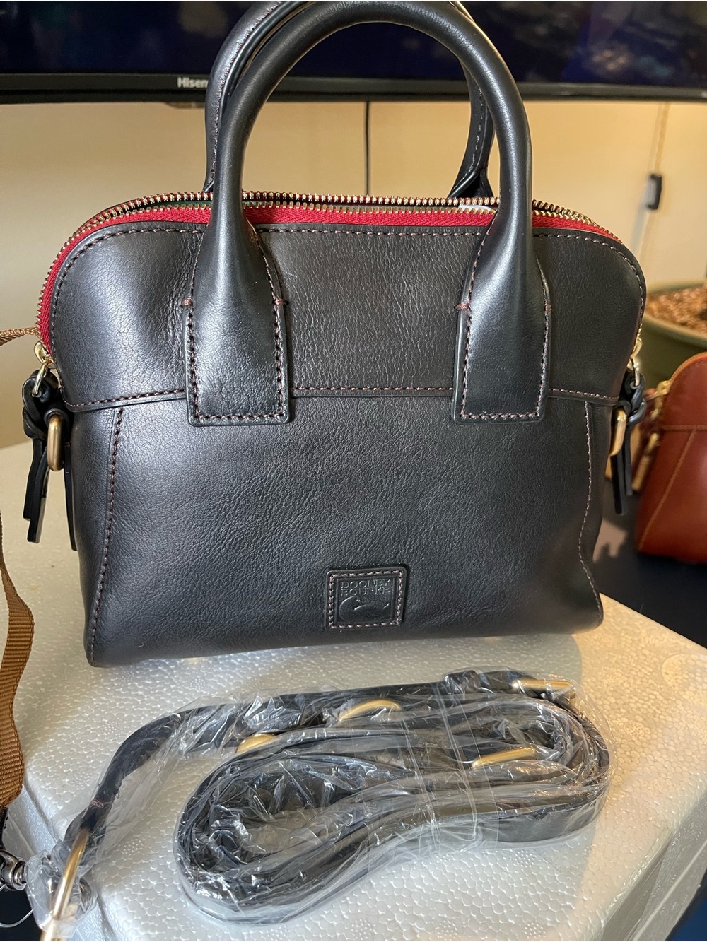 Dooney & Bourke Black Leather Crossbody with Red Zip Accent